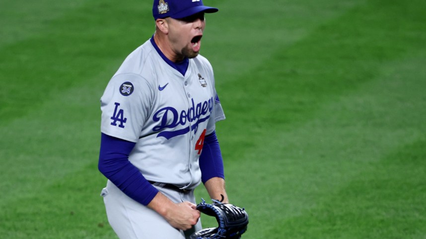 Oct 30, 2024; New York, New York, USA; Los Angeles Dodgers pitcher Blake Treinen (49) celebrates after the end of the eighth inning against the New York Yankees in game five of the 2024 MLB World Series at Yankee Stadium. Mandatory Credit: Wendell Cruz-Imagn Images