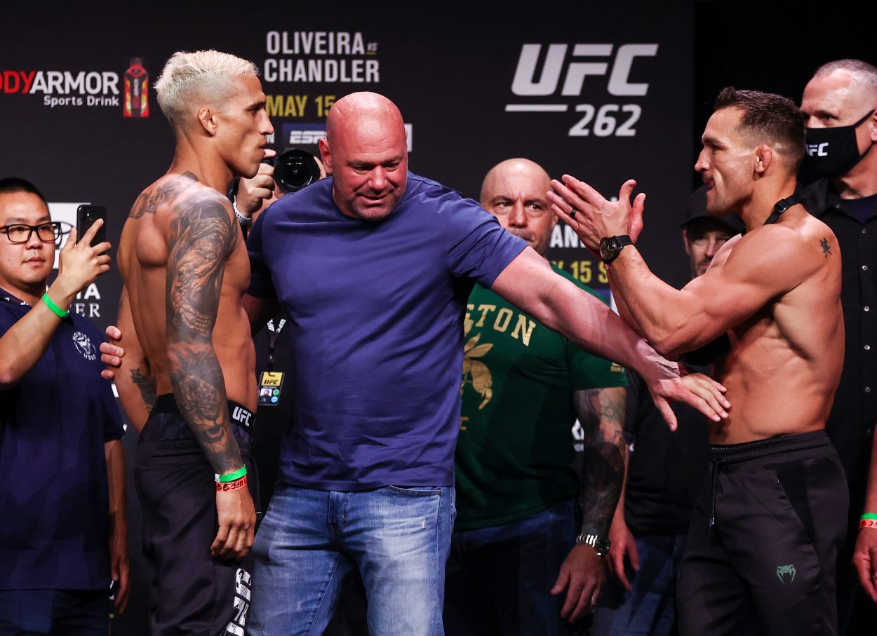 May 14, 2021; Houston, Texas, USA; Charles Oliveira and Dana White and Michael Chandler during weigh ins for UFC 262 at George R Brown Convention Center. Mandatory Credit: Troy Taormina-Imagn Images