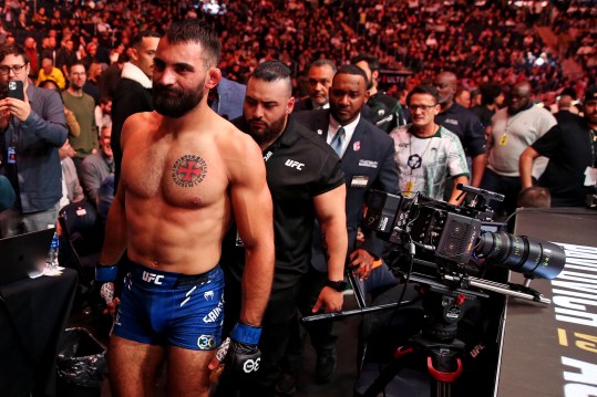 Nov 11, 2023; New York, NY, USA; Benoit Saint Denis (blue gloves)  walks away after beating Matt Frevola (red gloves) during UFC 295 at Madison Square Garden. Mandatory Credit: Wendell Cruz-Imagn Images