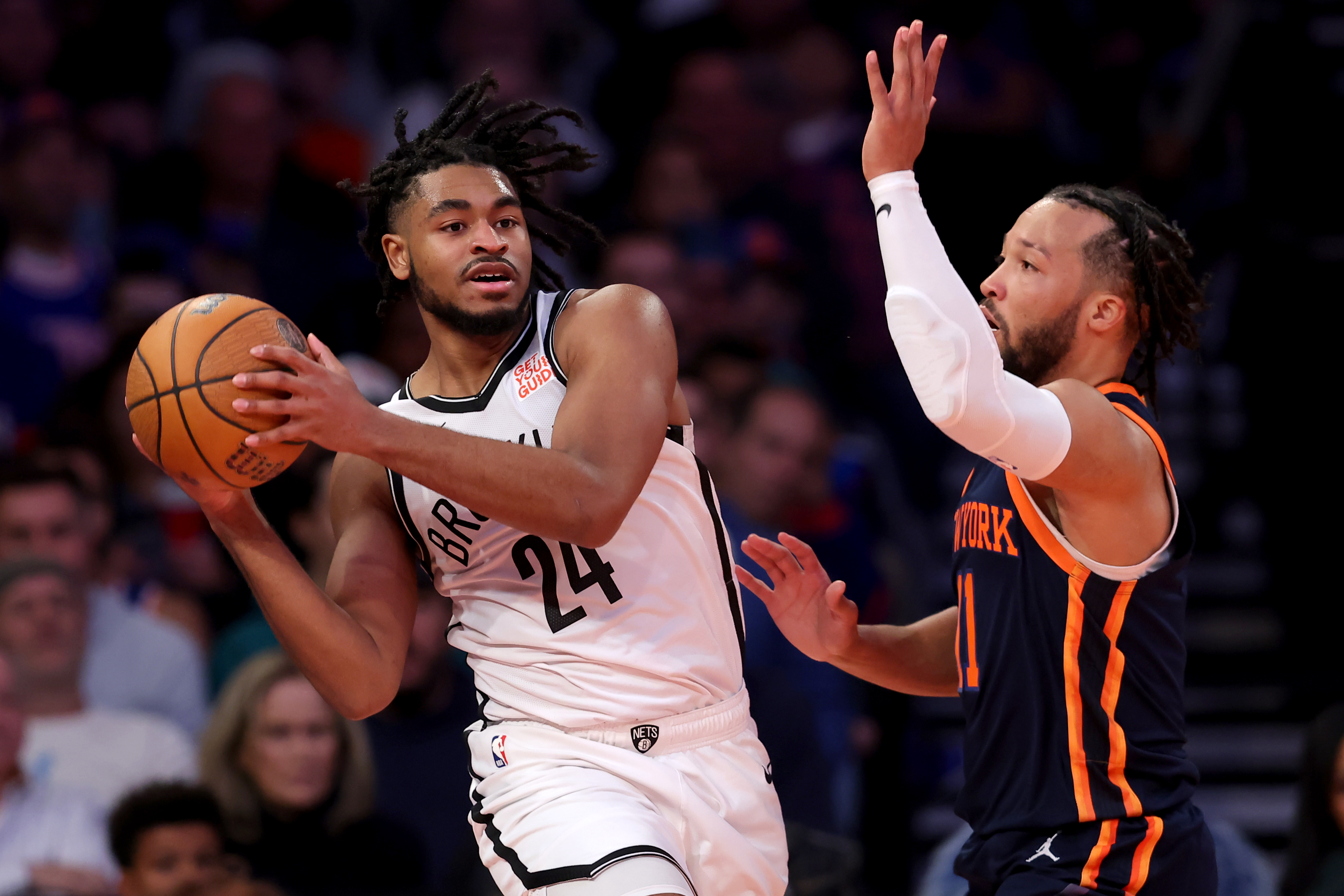 Nov 15, 2024; New York, New York, USA; Brooklyn Nets guard Cam Thomas (24) looks to pass the ball against New York Knicks guard Jalen Brunson (11) during the third quarter at Madison Square Garden. Mandatory Credit: Brad Penner-Imagn Images