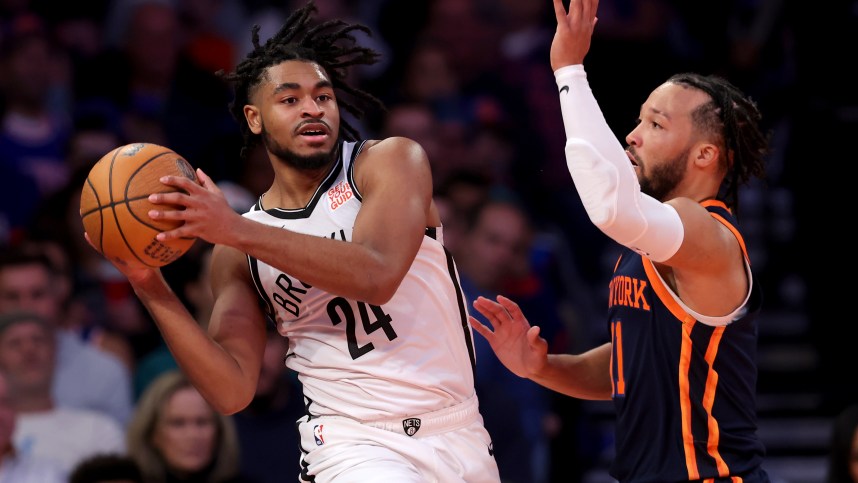 Nov 15, 2024; New York, New York, USA; Brooklyn Nets guard Cam Thomas (24) looks to pass the ball against New York Knicks guard Jalen Brunson (11) during the third quarter at Madison Square Garden. Mandatory Credit: Brad Penner-Imagn Images