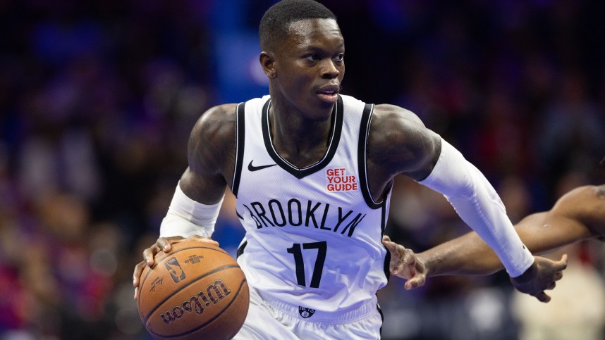 Nov 22, 2024; Philadelphia, Pennsylvania, USA; Brooklyn Nets guard Dennis Schroder (17) dribbles the ball against the Philadelphia 76ers during the first quarter at Wells Fargo Center. Mandatory Credit: Bill Streicher-Imagn Images