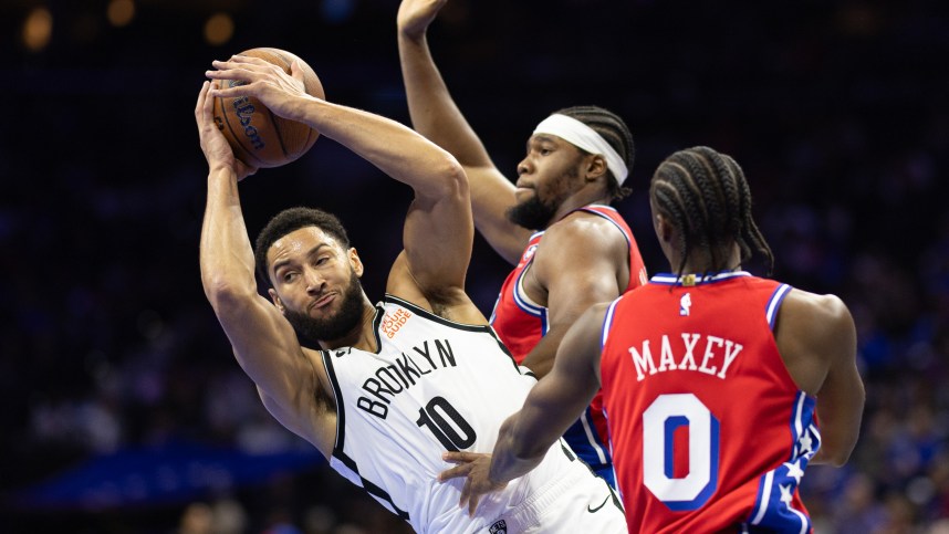 Nov 22, 2024; Philadelphia, Pennsylvania, USA; Brooklyn Nets guard Ben Simmons (10) controls the ball against Philadelphia 76ers guard Tyrese Maxey (0) and forward Guerschon Yabusele (28) during the second quarter at Wells Fargo Center. Mandatory Credit: Bill Streicher-Imagn Images