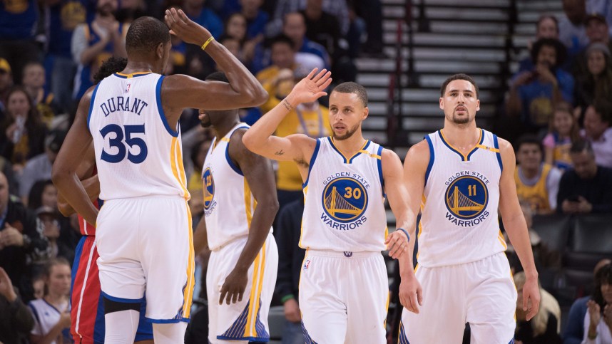 January 12, 2017; Oakland, CA, USA; Golden State Warriors forward Kevin Durant (35), guard Stephen Curry (30), and guard Klay Thompson (11) during the second quarter against the Detroit Pistons at Oracle Arena. The Warriors defeated the Pistons 127-107. Mandatory Credit: Kyle Terada-Imagn Images