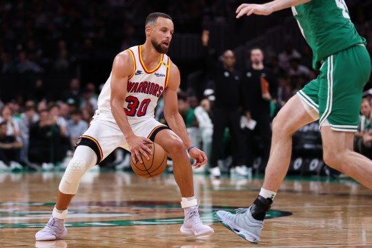 Nov 6, 2024; Boston, Massachusetts, USA; Golden State Warriors guard Stephen Curry (30) dribbles down the court during the second half against the Boston Celtics at TD Garden. Mandatory Credit: Paul Rutherford-Imagn Images