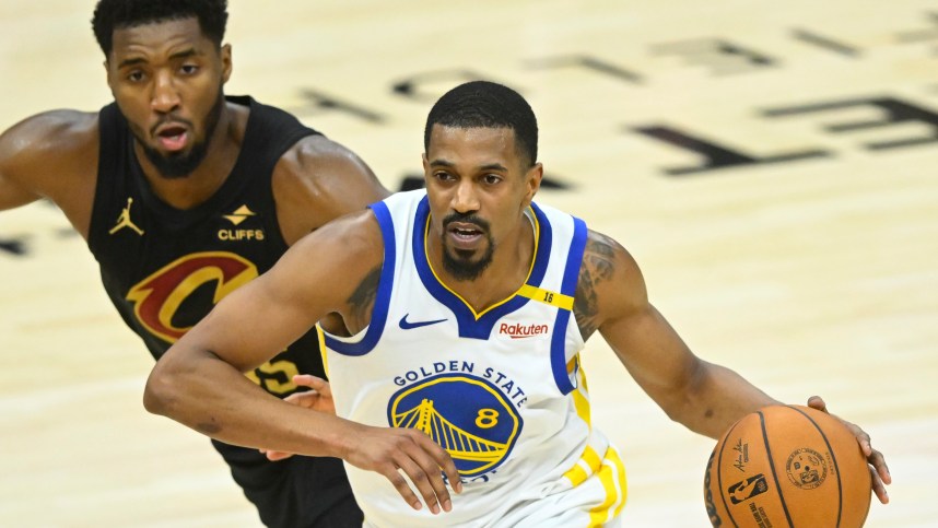 Nov 8, 2024; Cleveland, Ohio, USA; Golden State Warriors guard De'Anthony Melton (8) drives beside Cleveland Cavaliers guard Donovan Mitchell (45) in the fourth quarter at Rocket Mortgage FieldHouse. Mandatory Credit: David Richard-Imagn Images