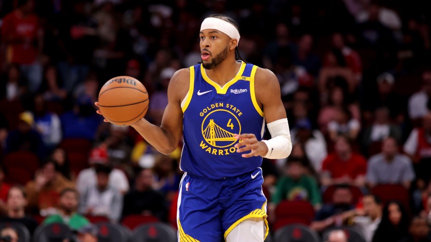 Nov 2, 2024; Houston, Texas, USA; Golden State Warriors guard Moses Moody (4) handles the ball against the Houston Rockets during the first quarter at Toyota Center. Mandatory Credit: Erik Williams-Imagn Images