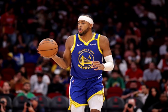 Nov 2, 2024; Houston, Texas, USA; Golden State Warriors guard Moses Moody (4) handles the ball against the Houston Rockets during the first quarter at Toyota Center. Mandatory Credit: Erik Williams-Imagn Images