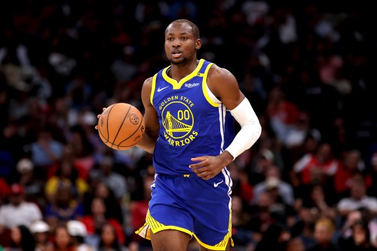 November 2, 2024; Houston, Texas, United States; Golden State Warriors forward Jonathan Kuminga (00) handles the ball against the Houston Rockets during the second quarter at Toyota Center. Mandatory Credit: Erik Williams-Imagn Images