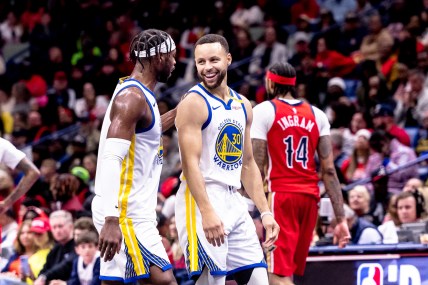 Nov 22, 2024; New Orleans, Louisiana, USA;  Golden State Warriors guard Stephen Curry (30) shares a moment with guard Buddy Hield (7) on a time out against the New Orleans Pelicans during second half at Smoothie King Center. Mandatory Credit: Stephen Lew-Imagn Images