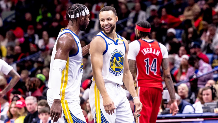 Nov 22, 2024; New Orleans, Louisiana, USA;  Golden State Warriors guard Stephen Curry (30) shares a moment with guard Buddy Hield (7) on a time out against the New Orleans Pelicans during second half at Smoothie King Center. Mandatory Credit: Stephen Lew-Imagn Images