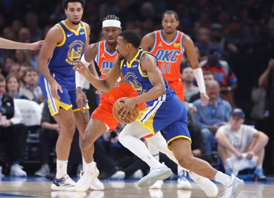 Nov 10, 2024; Oklahoma City, Oklahoma, USA; Golden State Warriors guard De'Anthony Melton (8) drives to the basket beside Oklahoma City Thunder guard Shai Gilgeous-Alexander (2) during the first quarter at Paycom Center. Mandatory Credit: Alonzo Adams-Imagn Images