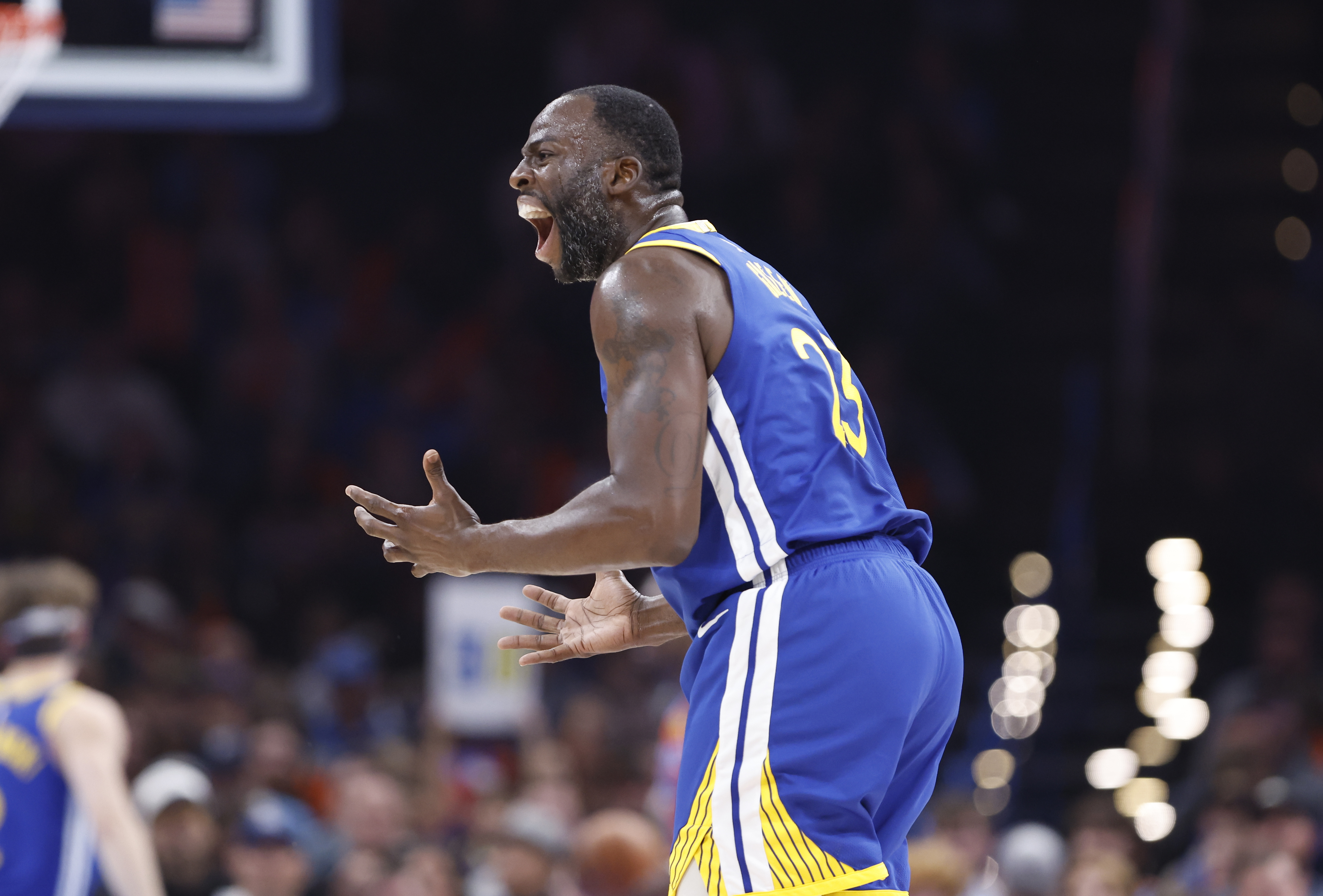 Nov 10, 2024; Oklahoma City, Oklahoma, USA; Golden State Warriors forward Draymond Green (23) reacts to an officials call during the second quarter against the Oklahoma City Thunder at Paycom Center. Mandatory Credit: Alonzo Adams-Imagn Images