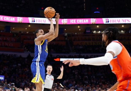 Nov 10, 2024; Oklahoma City, Oklahoma, USA; Golden State Warriors guard De'Anthony Melton (8) shoots a three point basket against the Oklahoma City Thunder during the second half at Paycom Center. Mandatory Credit: Alonzo Adams-Imagn Images