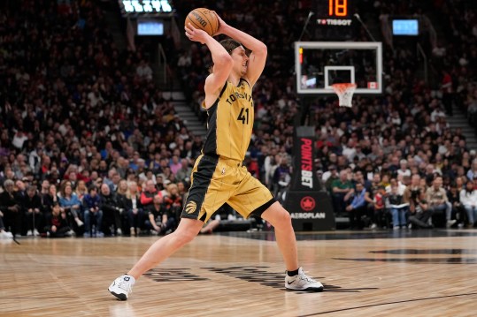 Mar 1, 2024; Toronto, Ontario, CAN; Toronto Raptors forward Kelly Olynyk (41) goes to pass the ball against the Golden State Warriors during the first half at Scotiabank Arena. Mandatory Credit: John E. Sokolowski-Imagn Images