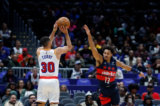 Nov 4, 2024; Washington, District of Columbia, USA; Golden State Warriors guard Stephen Curry (30) shoots the ball over Washington Wizards guard Jordan Poole (13) in the first half at Capital One Arena. Mandatory Credit: Geoff Burke-Imagn Images