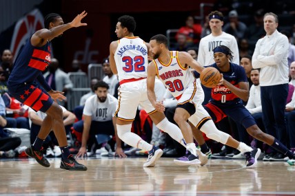 Nov 4, 2024; Washington, District of Columbia, USA; Golden State Warriors guard Stephen Curry (30) dribbles the ball past Washington Wizards guard Bilal Coulibaly (0) in the first half at Capital One Arena. Mandatory Credit: Geoff Burke-Imagn Images