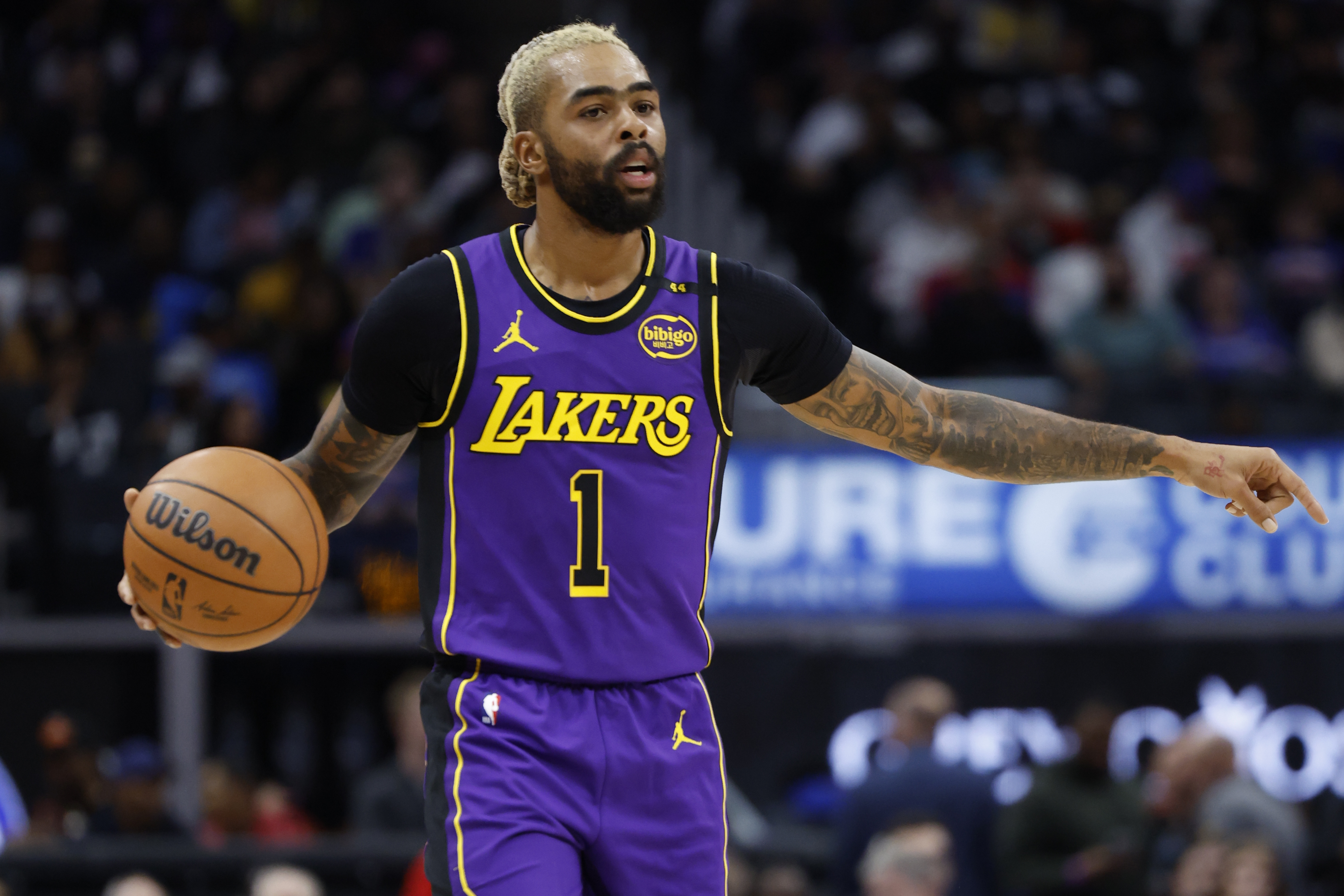 Nov 4, 2024; Detroit, Michigan, USA; Los Angeles Lakers guard D'Angelo Russell (1) dribbles in the first half against the Detroit Pistons at Little Caesars Arena. Mandatory Credit: Rick Osentoski-Imagn Images