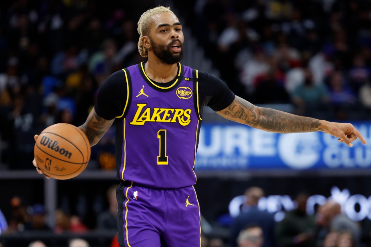 Nov 4, 2024; Detroit, Michigan, USA; Los Angeles Lakers guard D'Angelo Russell (1) dribbles in the first half against the Detroit Pistons at Little Caesars Arena. Mandatory Credit: Rick Osentoski-Imagn Images