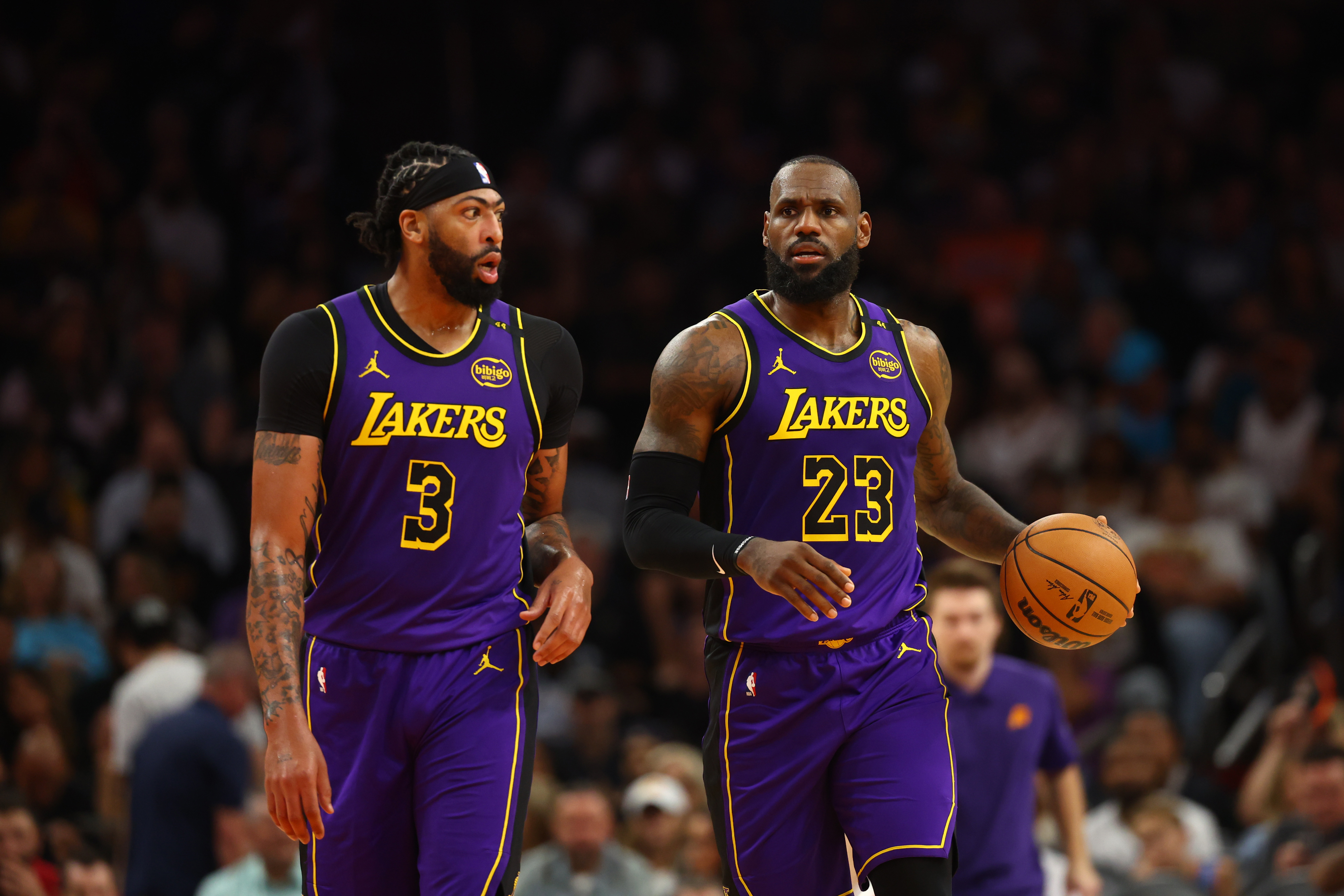 Oct 28, 2024; Phoenix, Arizona, USA; Los Angeles Lakers forward LeBron James (23) and forward Anthony Davis (3) against the Phoenix Suns at Footprint Center. Mandatory Credit: Mark J. Rebilas-Imagn Images