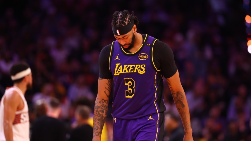 Oct 28, 2024; Phoenix, Arizona, USA; Los Angeles Lakers forward Anthony Davis (3) reacts against the Phoenix Suns at Footprint Center. Mandatory Credit: Mark J. Rebilas-Imagn Images