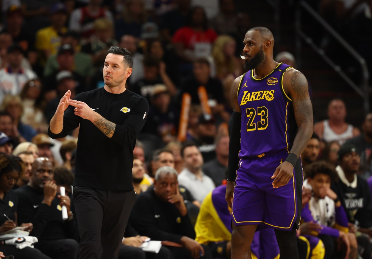 Oct 28, 2024; Phoenix, Arizona, USA; Los Angeles Lakers head coach JJ Redick with forward LeBron James (23) against the Phoenix Suns at Footprint Center. Mandatory Credit: Mark J. Rebilas-Imagn Images