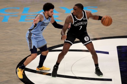 Nov 4, 2024; Brooklyn, New York, USA; Brooklyn Nets guard Shake Milton (7) controls the ball against Memphis Grizzlies guard Scotty Pippen Jr. (1) during the fourth quarter at Barclays Center. Mandatory Credit: Brad Penner-Imagn Images