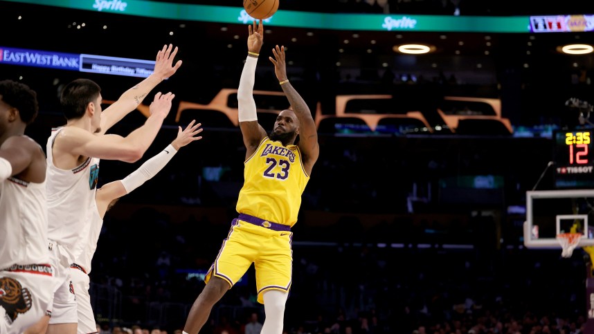 Nov 13, 2024; Los Angeles, California, USA;  Los Angeles Lakers forward LeBron James (23) shoots the ball during the second quarter against the Memphis Grizzlies at Crypto.com Arena. Mandatory Credit: Kiyoshi Mio-Imagn Images