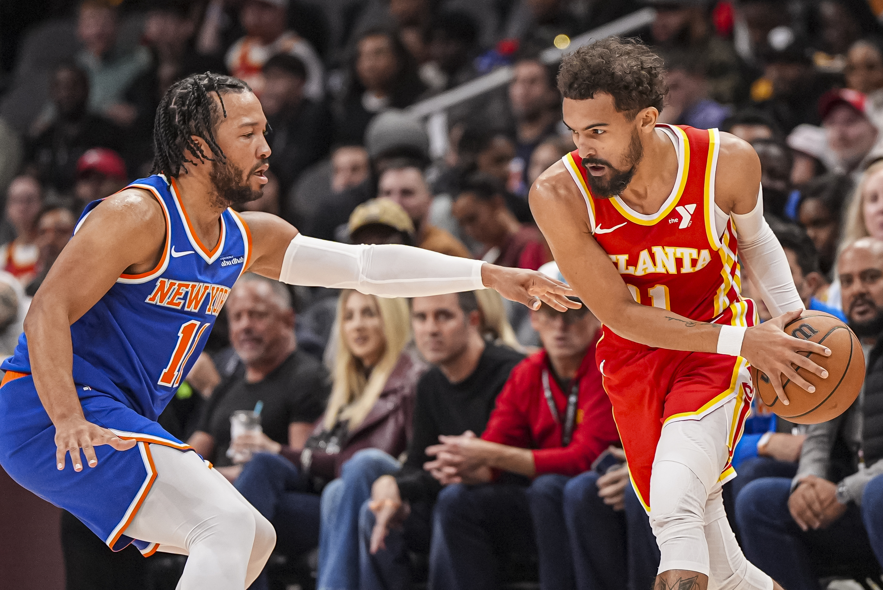 Nov 6, 2024; Atlanta, Georgia, USA; Atlanta Hawks guard Trae Young (11) is defended by New York Knicks guard Jalen Brunson (11) during the first half at State Farm Arena. Mandatory Credit: Dale Zanine-Imagn Images