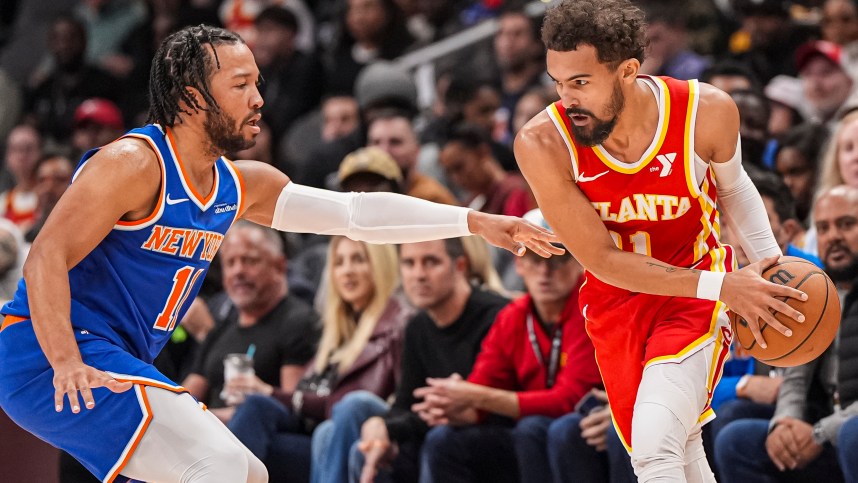 Nov 6, 2024; Atlanta, Georgia, USA; Atlanta Hawks guard Trae Young (11) is defended by New York Knicks guard Jalen Brunson (11) during the first half at State Farm Arena. Mandatory Credit: Dale Zanine-Imagn Images