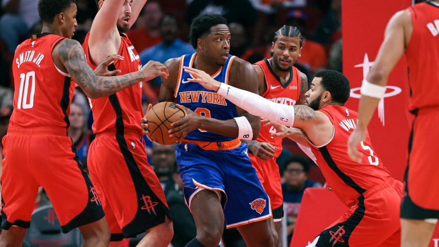 Nov 4, 2024; Houston, Texas, USA; New York Knicks forward OG Anunoby (8) attempts to control the ball as Houston Rockets guard Fred VanVleet (5) defends during the first quarter at Toyota Center. Mandatory Credit: Troy Taormina-Imagn Images