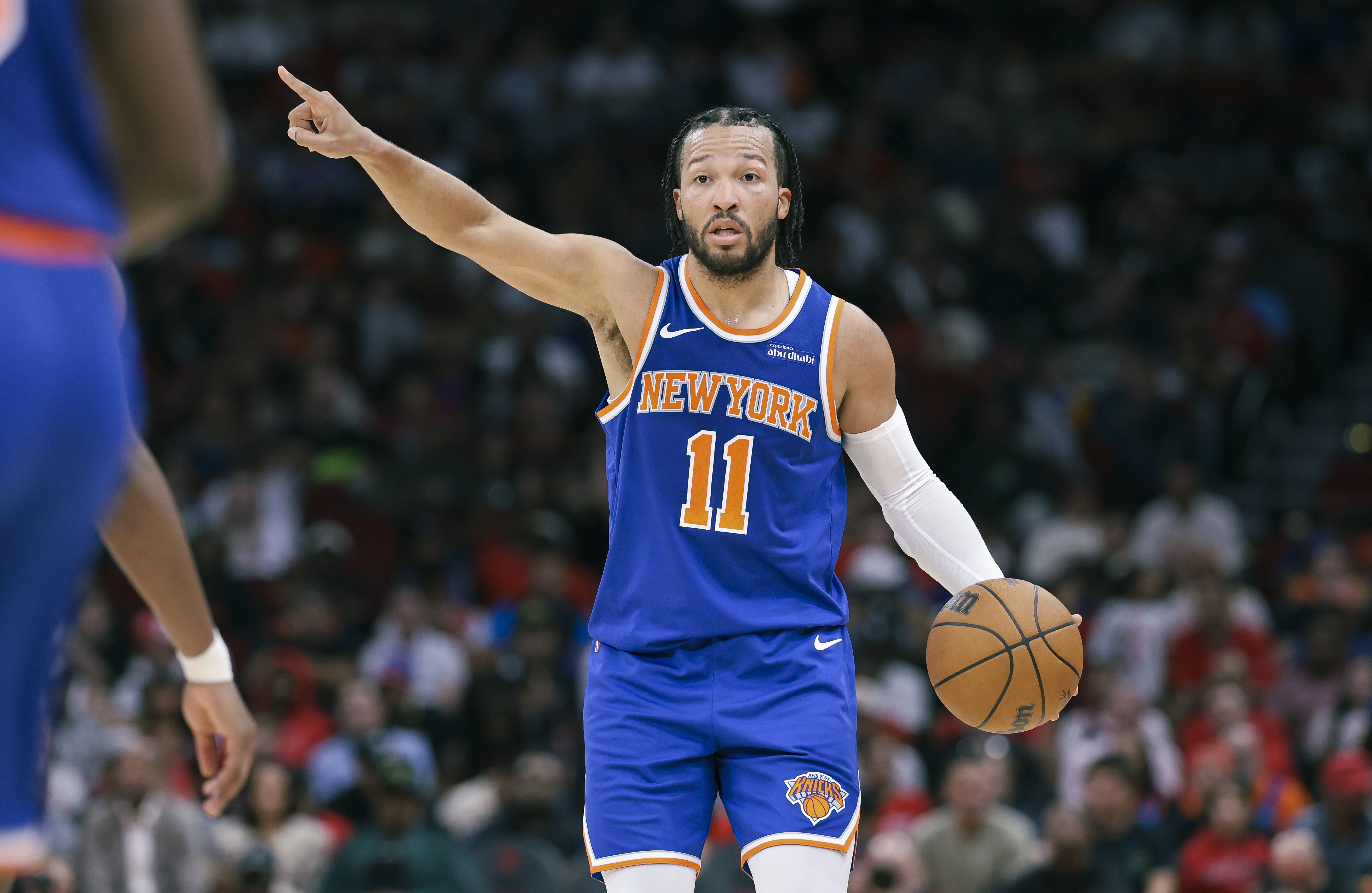 Nov 4, 2024; Houston, Texas, USA; New York Knicks guard Jalen Brunson (11) brings the ball up the court during the third quarter against the Houston Rockets at Toyota Center. Mandatory Credit: Troy Taormina-Imagn Images