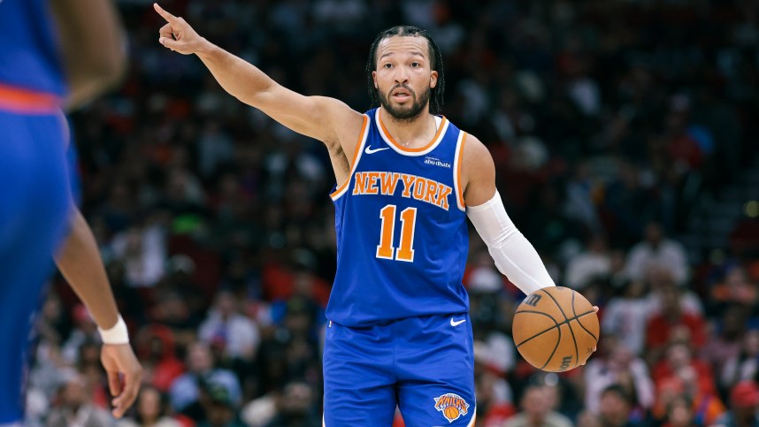 Nov 4, 2024; Houston, Texas, USA; New York Knicks guard Jalen Brunson (11) brings the ball up the court during the third quarter against the Houston Rockets at Toyota Center. Mandatory Credit: Troy Taormina-Imagn Images