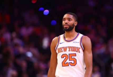 Nov 20, 2024; Phoenix, Arizona, USA; New York Knicks forward Mikal Bridges (25) against the Phoenix Suns at Footprint Center. Mandatory Credit: Mark J. Rebilas-Imagn Images