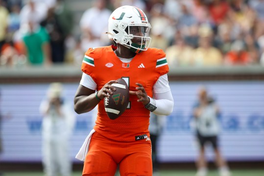 Nov 9, 2024; Atlanta, Georgia, USA; Miami Hurricanes quarterback Cam Ward (1) drops back to pass against the Georgia Tech Yellow Jackets in the third quarter at Bobby Dodd Stadium at Hyundai Field. Mandatory Credit: Brett Davis-Imagn Images