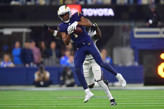 Nov 25, 2024; Inglewood, California, USA; Los Angeles Chargers wide receiver Quentin Johnston (1) catches a pass against the Baltimore Ravens during the second half at SoFi Stadium. Mandatory Credit: Gary A. Vasquez-Imagn Images