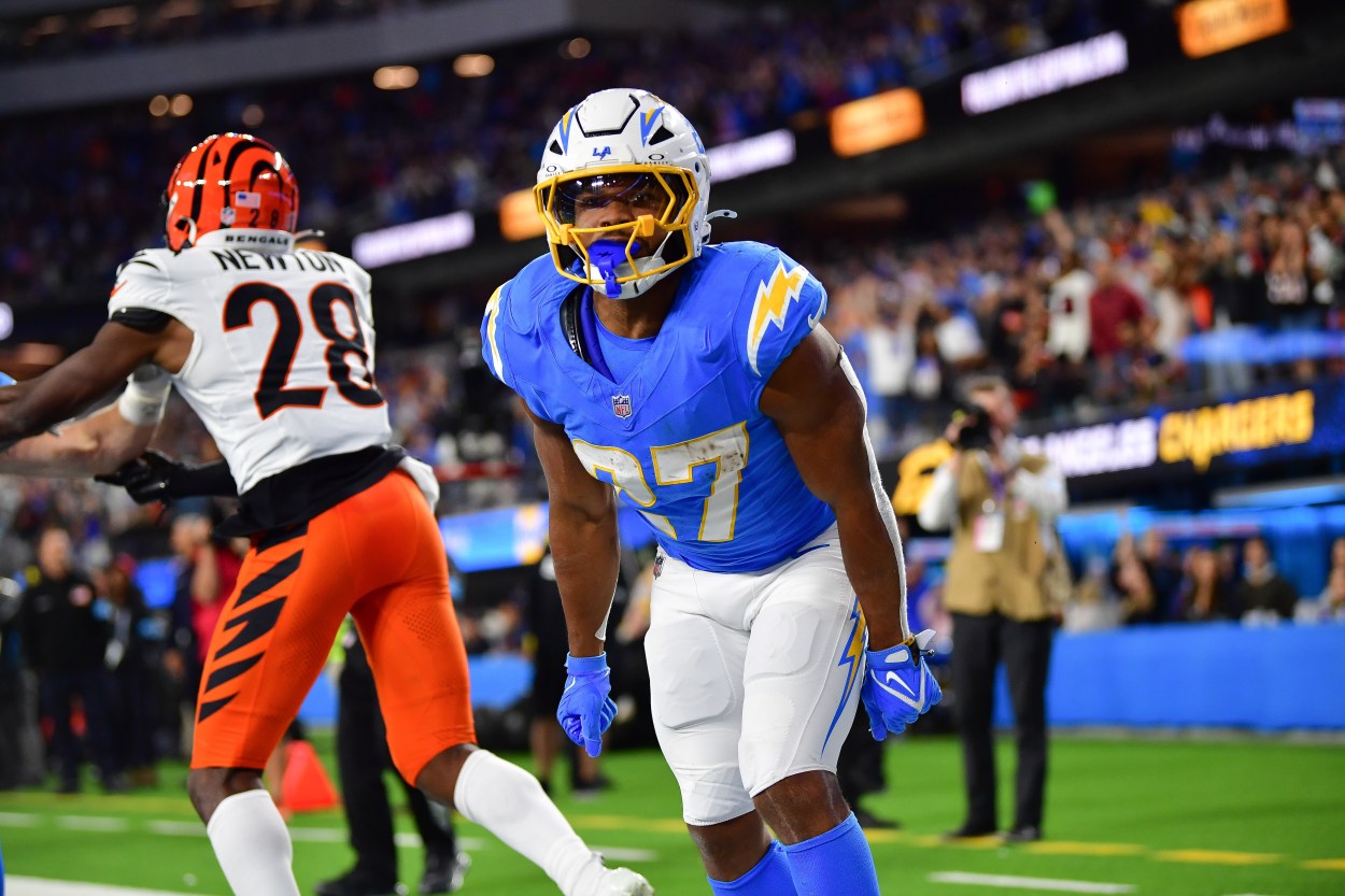 Nov 17, 2024; Inglewood, California, USA; Los Angeles Chargers running back J.K. Dobbins (27) celebrates his touchdown scored against the Cincinnati Bengals during the second half at SoFi Stadium. Mandatory Credit: Gary A. Vasquez-Imagn Images