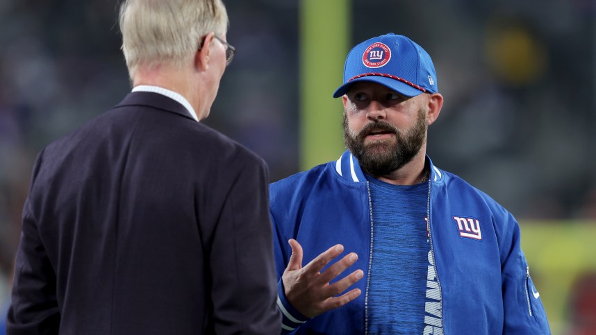 Oct 13, 2024; East Rutherford, New Jersey, USA; New York Giants head coach Brian Daboll talks to co-owner John Mara before a game against the Cincinnati Bengals at MetLife Stadium. Mandatory Credit: Brad Penner-Imagn Images