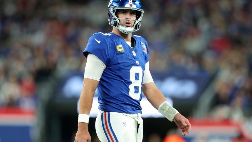 Oct 13, 2024; East Rutherford, New Jersey, USA; New York Giants quarterback Daniel Jones (8) reacts during the third quarter against the Cincinnati Bengals at MetLife Stadium. Mandatory Credit: Brad Penner-Imagn Images