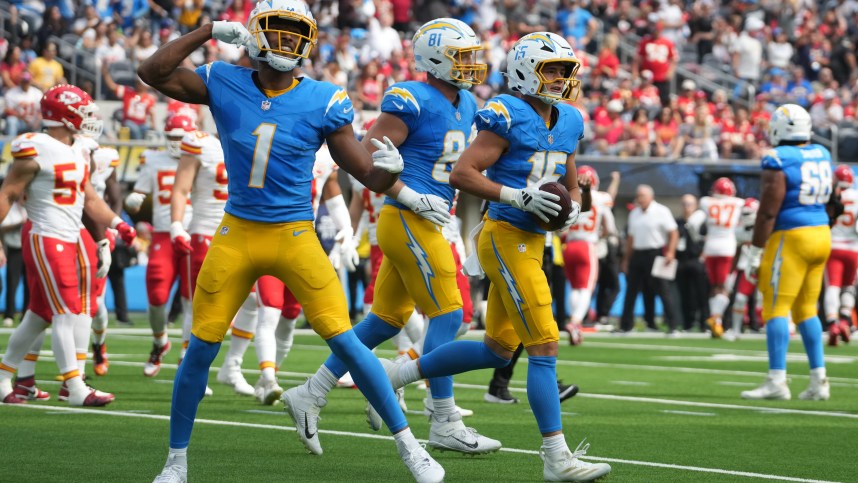 Sep 29, 2024; Inglewood, California, USA; Los Angeles Chargers wide receiver Ladd McConkey (15) celebrates with wide receiver Quentin Johnston (1) and 	ight end Will Dissly (81) after catching a 7-yard touchdown pass against the Kansas City Chiefs in the first quarter at SoFi Stadium. Mandatory Credit: Kirby Lee-Imagn Images