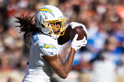 Nov 3, 2024; Cleveland, Ohio, USA; Los Angeles Chargers wide receiver Quentin Johnston (1) makes a reception against the Cleveland Browns during the second quarter at Huntington Bank Field. Mandatory Credit: Scott Galvin-Imagn Images