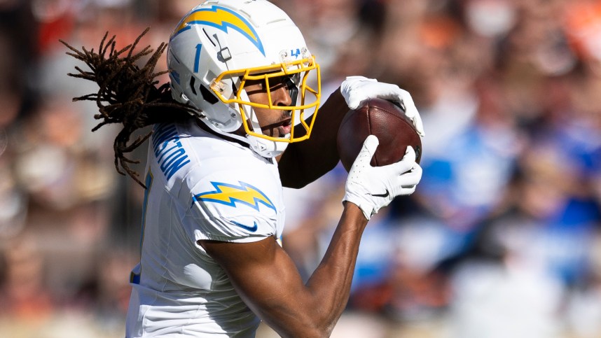 Nov 3, 2024; Cleveland, Ohio, USA; Los Angeles Chargers wide receiver Quentin Johnston (1) makes a reception against the Cleveland Browns during the second quarter at Huntington Bank Field. Mandatory Credit: Scott Galvin-Imagn Images