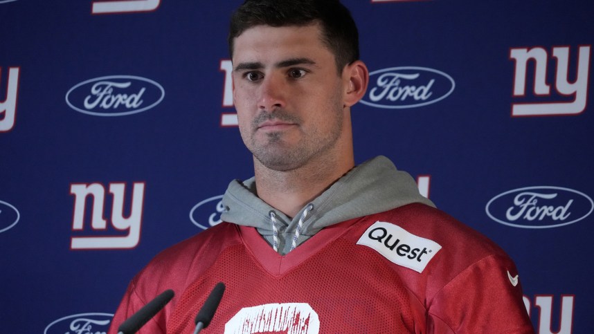 Nov 8, 2024; Munich, Germany; New York Giants quarterback Daniel Jones (8) during press conference at the FC Bayern Munchen training grounds at Sabener Strasse.  Mandatory Credit: Kirby Lee-Imagn Images