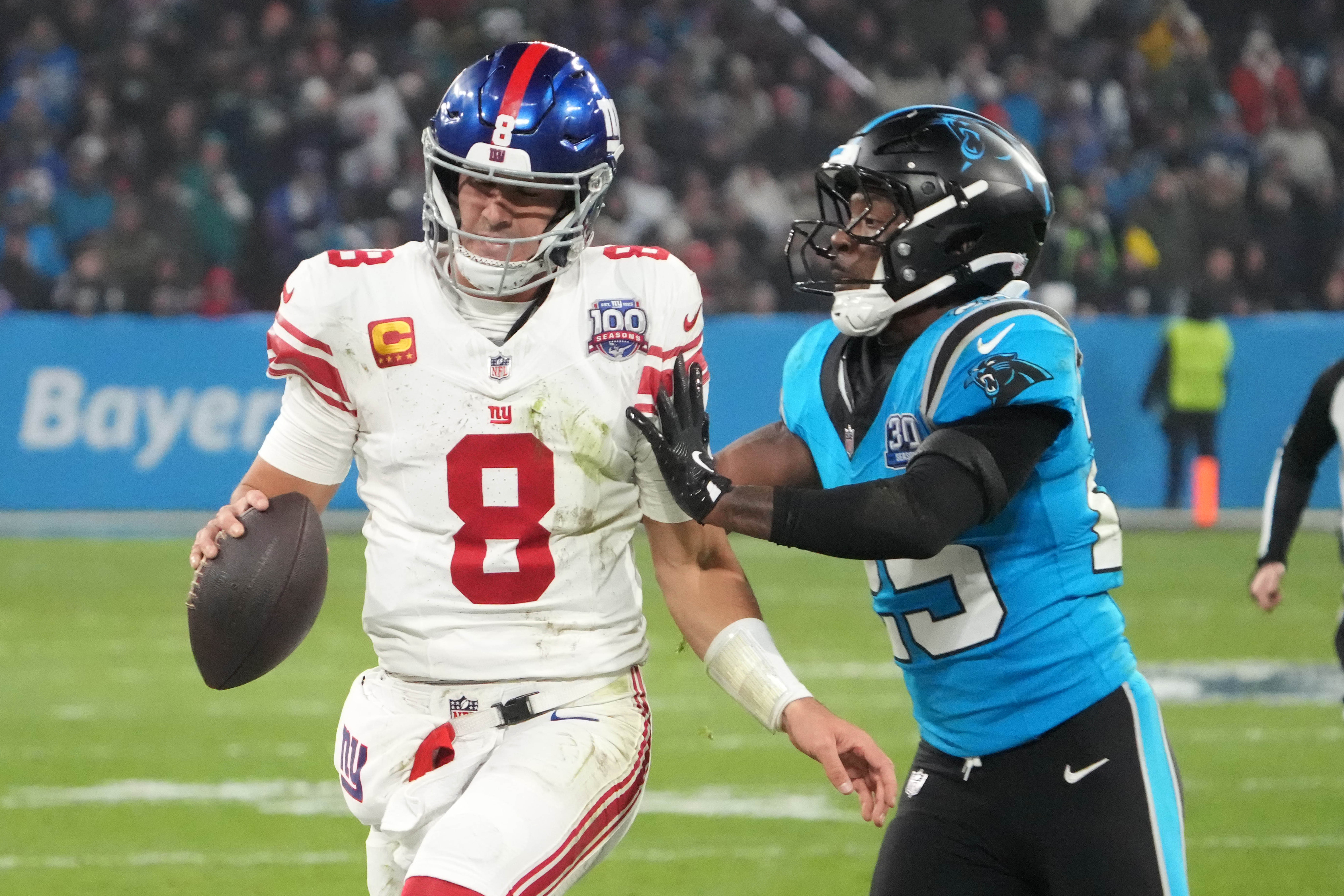 Nov 10, 2024; Munich, Germany; Carolina Panthers cornerback Jaycee Horn (8) carries the ball against Carolina Panthers safety Xavier Woods (25) in the second half during the 2024 NFL Munich Game at Allianz Arena. Mandatory Credit: Kirby Lee-Imagn Images