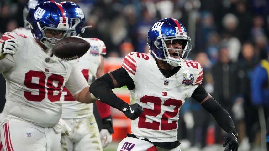 Nov 10, 2024; Munich, Germany; New York Giants cornerback Dru Phillips (22) reacts against the Carolina Panthers in the second half during the 2024 NFL Munich Game at Allianz Arena. Mandatory Credit: Kirby Lee-Imagn Images