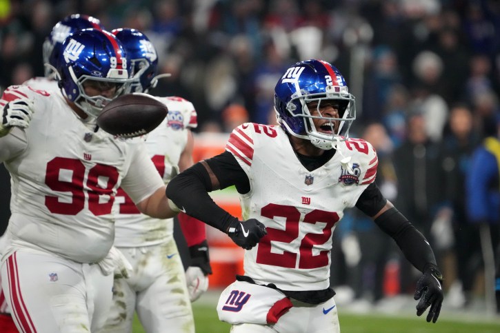 Nov 10, 2024; Munich, Germany; New York Giants cornerback Dru Phillips (22) reacts against the Carolina Panthers in the second half during the 2024 NFL Munich Game at Allianz Arena. Mandatory Credit: Kirby Lee-Imagn Images