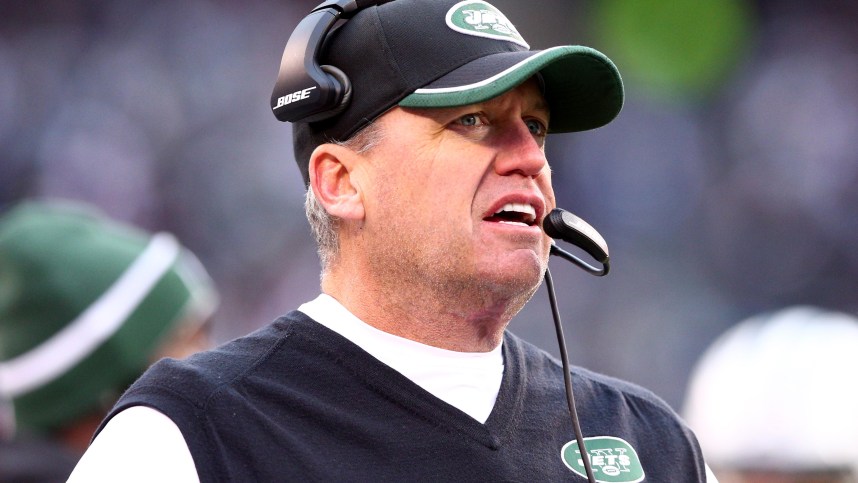 Dec 21, 2014; East Rutherford, NJ, USA; New York Jets head coach Rex Ryan coaches against the New England Patriots during the third quarter at MetLife Stadium. The Patriots defeated the Jets 17-16. Mandatory Credit: Brad Penner-Imagn Images