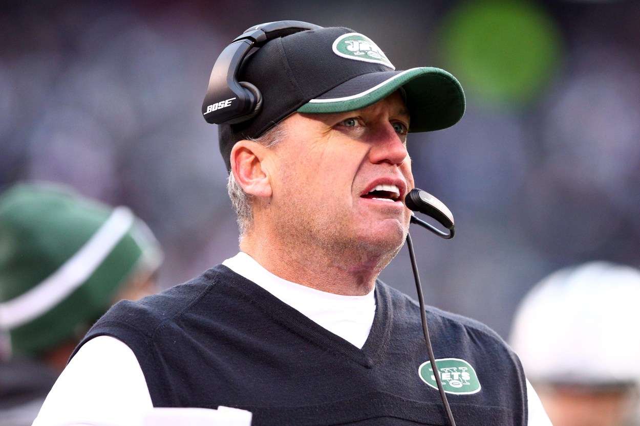 Dec 21, 2014; East Rutherford, NJ, USA; New York Jets head coach Rex Ryan coaches against the New England Patriots during the third quarter at MetLife Stadium. The Patriots defeated the Jets 17-16. Mandatory Credit: Brad Penner-Imagn Images