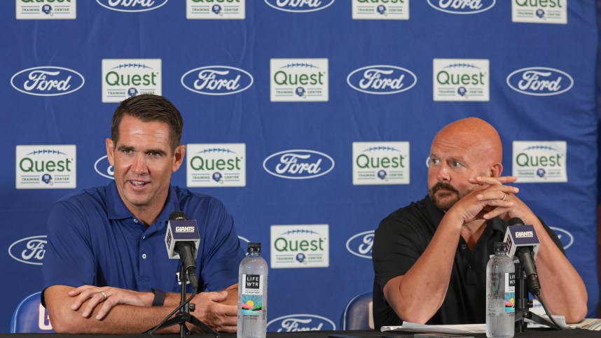 Jul 24, 2024; East Rutherford, NJ, USA; New York Giants general manager Joe Schoen (left) and head coach Brian Dabol talks to media before the start of training camp at Quest Diagnostics Training Facility. Mandatory Credit: Vincent Carchietta-Imagn Images