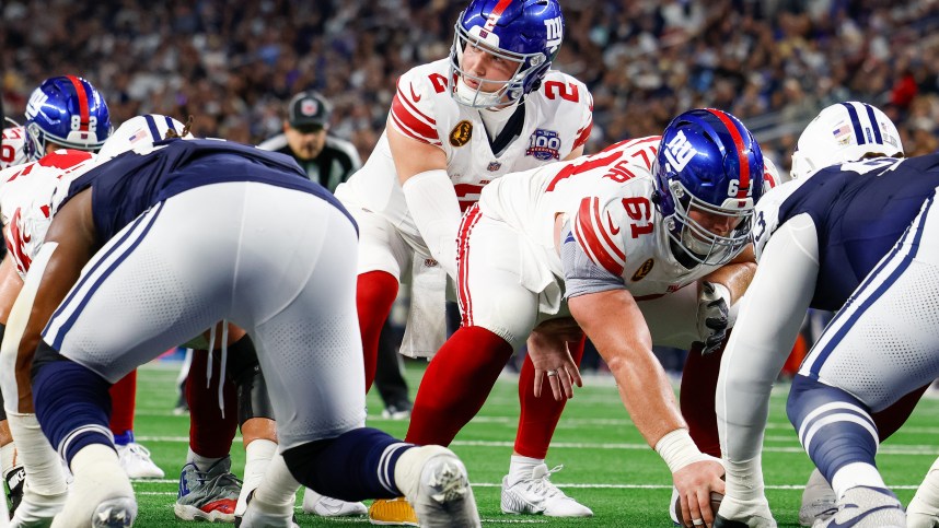 Nov 28, 2024; Arlington, Texas, USA; New York Giants quarterback Drew Lock (2) is under center during the first quarter against the Dallas Cowboys at AT&T Stadium. Mandatory Credit: Andrew Dieb-Imagn Images